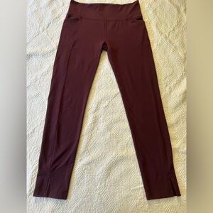 Athleta straight leggings/pants. . Berry color Large/Tall. Bottom vents. Decent.